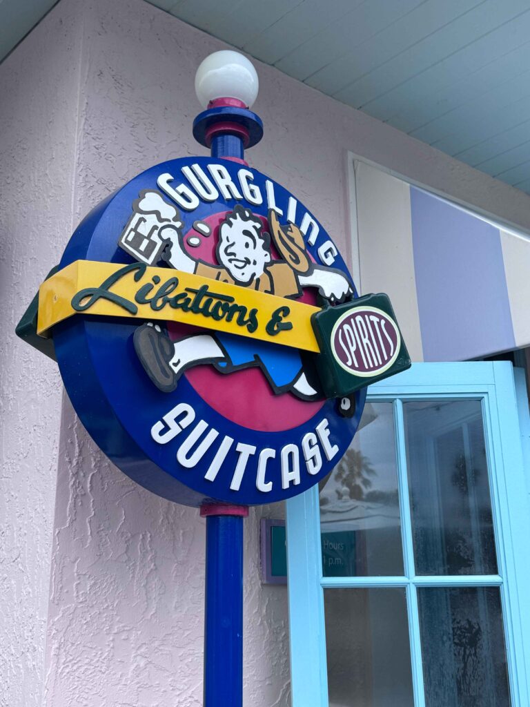 outside of the Gurgling Suitcase - the logo and sign